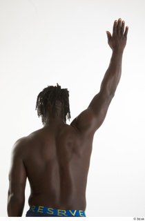 Kato Abimbo  1 arm back view flexing nude 0005.jpg